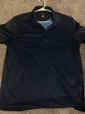 Greg Norman Collection Men's Dark Navy Polo with Subtle Pattern